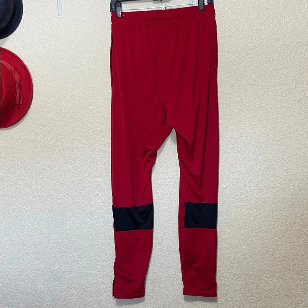 Jordan Red Warm Up Pants With Zipper At Hems. Good Condition. Size M.